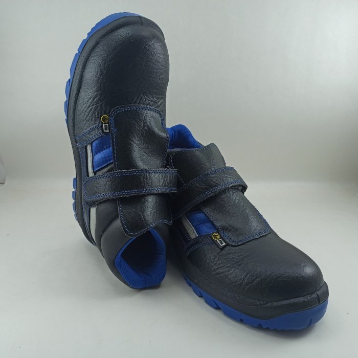 Bota de seguridad de piel negra con detalles en azul y cierre de velcro Fal seguridad mod. Segura