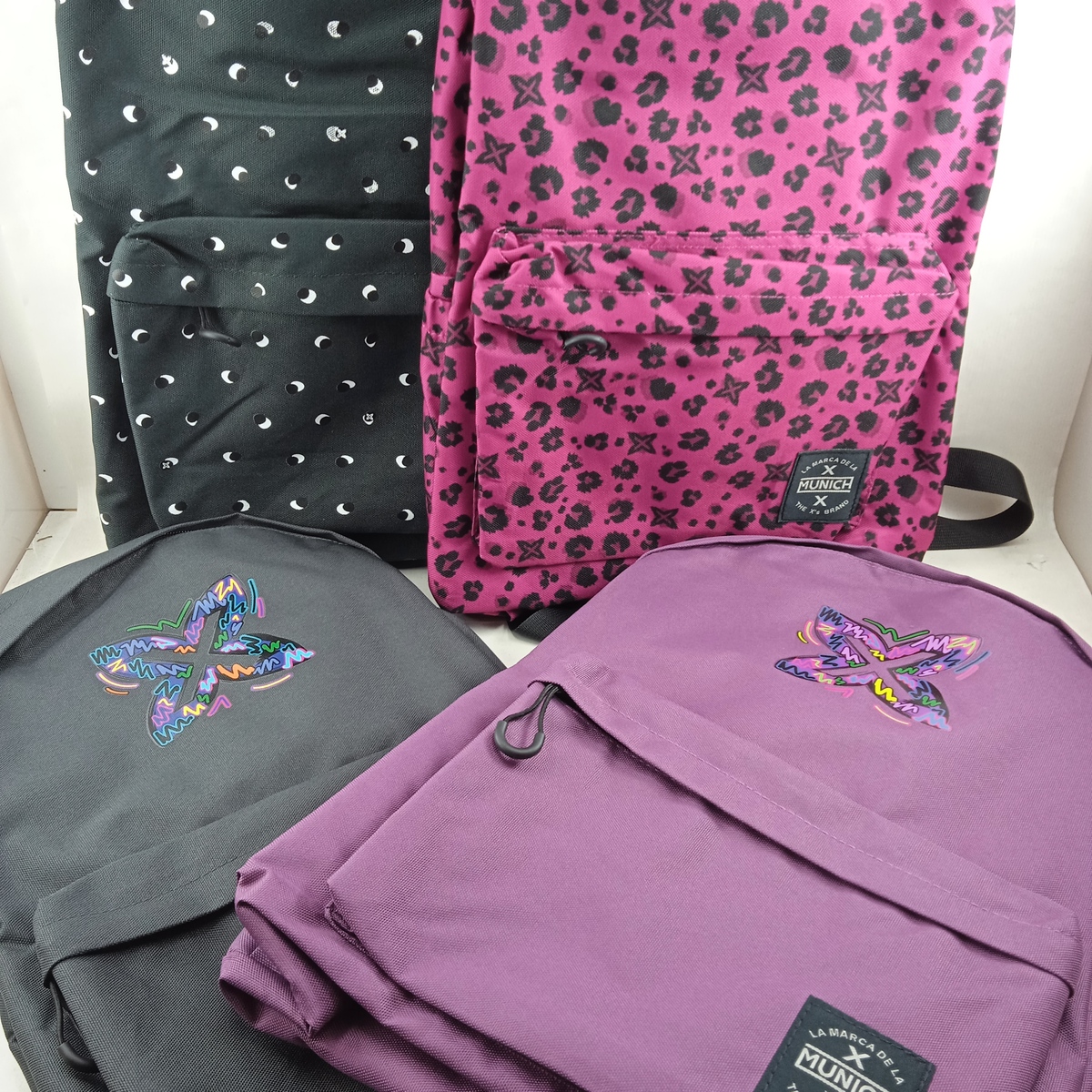 Mochila sintetica varios colores y cierre de cremallera, Munich mod. 7058077